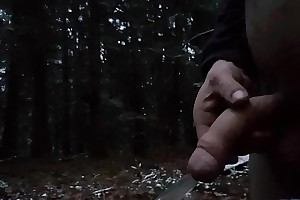 Young man piss in the Forest