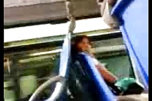 Locate flashing around gripping woman in the bus